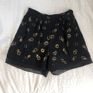 Shorts with sheer silk and gold thread layer